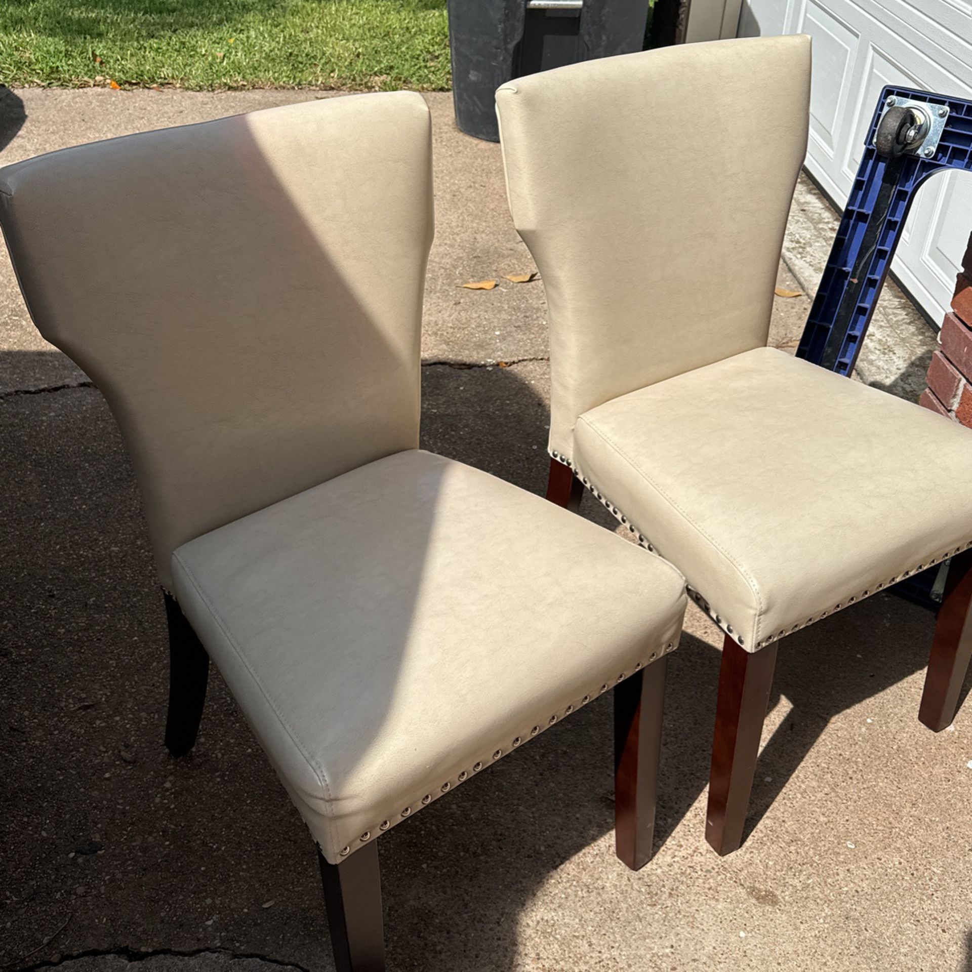 4 Beige Leather Chairs