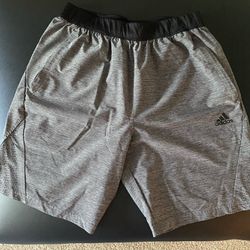 Adidas Mens Medium Work out shorts. Lightly used, in great condition. Both zipper pockets work have no issues. 