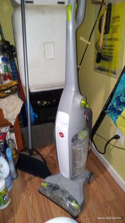 Hoover floor bare floor scrubbing machine.