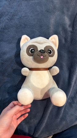Gray stuffed puppy