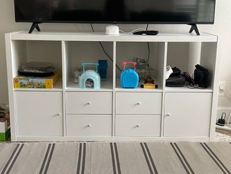 White TV stand with storage