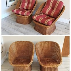 Pair of Vintage Rattan Barrel Pod Bucket Chairs With Cushions likely produced in the 1960s or 1970s.