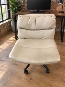 Cream Leather Armless Office Chair with Wheels