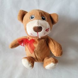 Small Teddy Bear with Red Ribbon