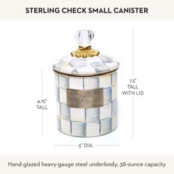 MacKenzie-Childs ceramic small canister in a creamy finish. Features a small metallic detail on lid. Simple, elegant piece for display or storage.