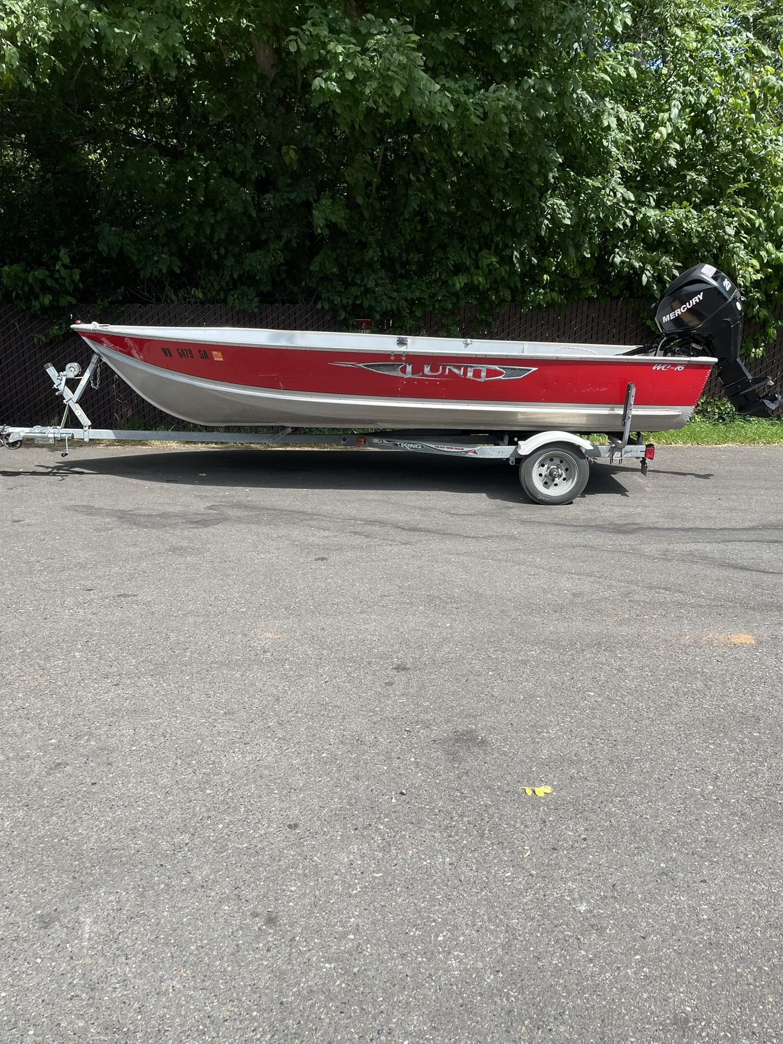 16’ Lund With 25 HP Mercury Outboard & Trailer