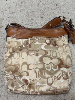 Coach - Brown Canvas with leather trip