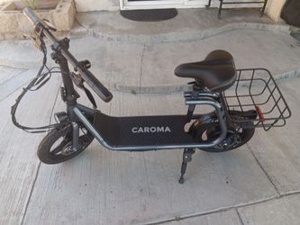 Caroma Electric Scooter with Seat and Basket ( NEEDS BATTERY ) FOR $80