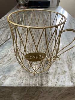 Gold coffee pod holder