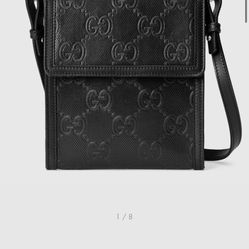 Gucci GG embossed messenger bag