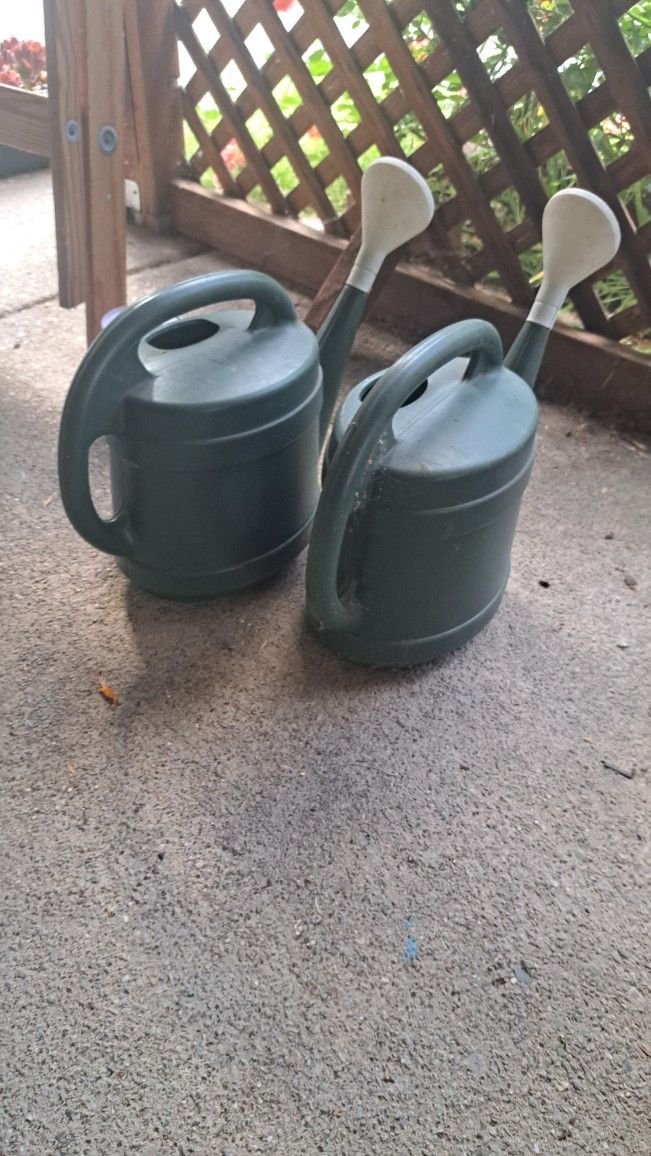 2 Plastic Watering Cans