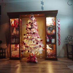 Two Lighted Glass Cabinets 