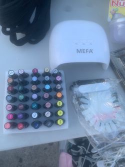 MEFA brand UV nail lamp features three timer settings (30s, 60s, 90s) for curing gel polish.