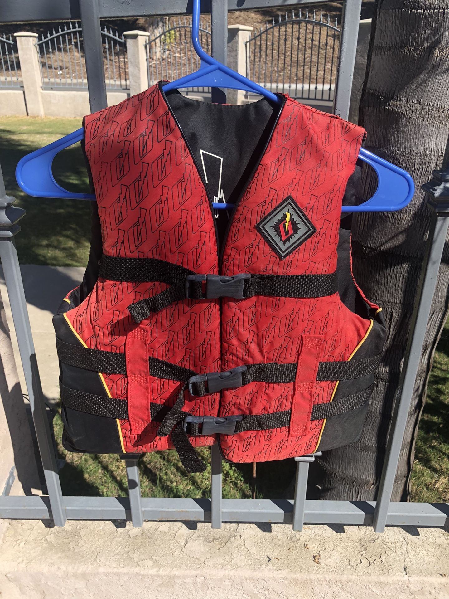 Assorted Life Jackets And Wet Suits