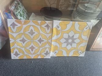 framed wall art pieces are Madison Park "Tuscan Tiles" in Yellow, featuring a distressed bohemian design on canvas with a gel coat finish.
