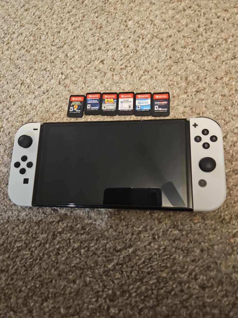 Nintendo Switch OLED + 6 Games And Case