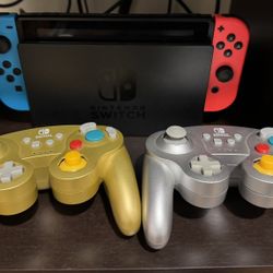 (Nintendo Switch w/ 04 Controllers and Joycons and more!