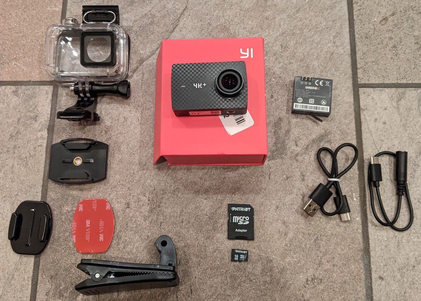 YI 4k Plus action camera with accessories