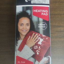 NEVER USED/SEALED.  XL Electric/Washable Heating Pad