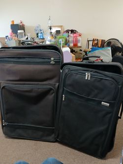 2 American Tourister Suitcasest