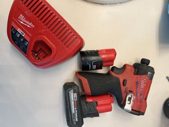 Milwaukee fuel brushless impact with 5.0 output battery 2.0ah battery and lightning charger