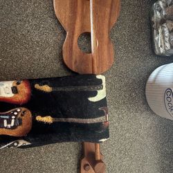 wood guitar holder w/ towel