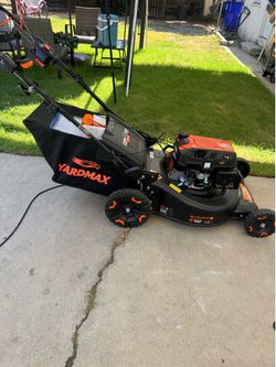 YARDMAX 24 in. 201cc Electric Start SELECT PACE 6 Speed CVT High Wheel RWD 3-in-1 Gas Walk Behind Self Propelled Lawn Mower