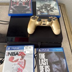 PS4 with games & controller
