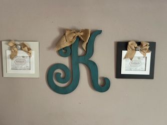 Large letter K and picture frames