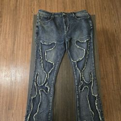 Rip and Repair" denim jeans