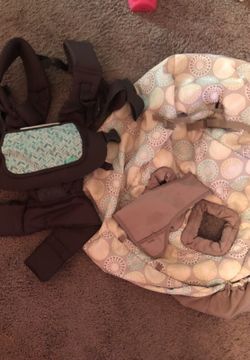 Shopping cart/high chair cover and baby carrier. Great condition. Baby carrier was used for literally 1hr. Asking $20 for both. Paid $40 for each