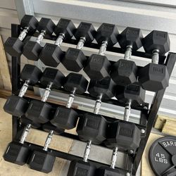 New pair of 10,15,20,25,30,45,50 and 55lb rubber dumbbells + rack NEW IN BOX $575