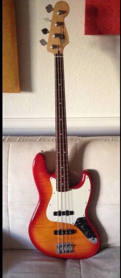 Fender Jazz Bass Special Edition, DiMarzio pickups, Custom Electronics, Hard Shell Case.  Fender FSR 2005