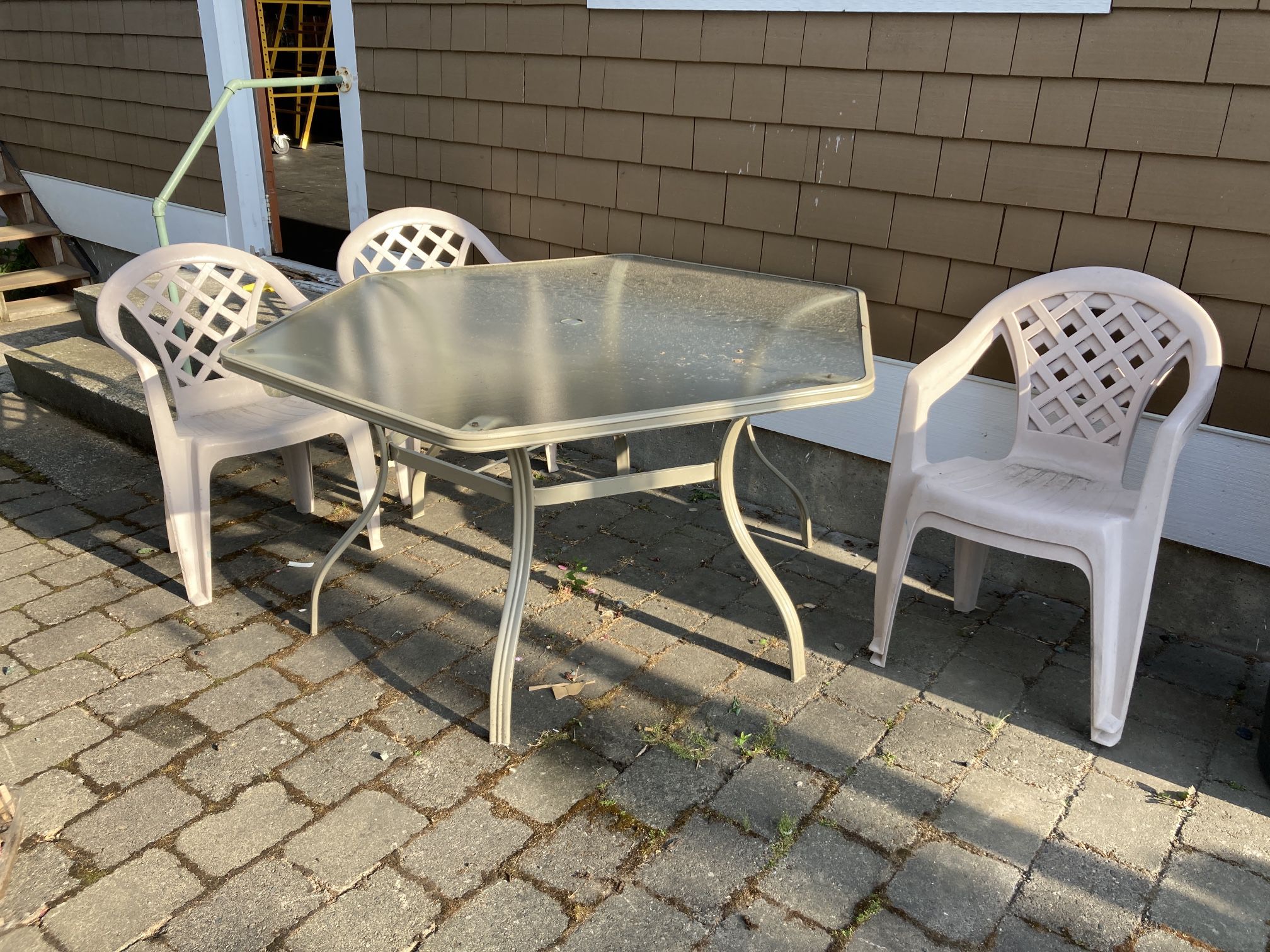 Glass Patio Table And Seven Chairs
