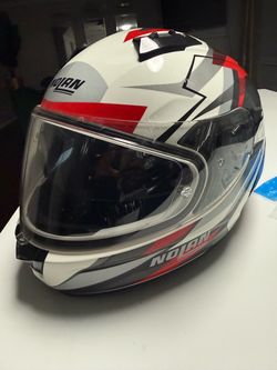Nolan helmet (never worn too small )