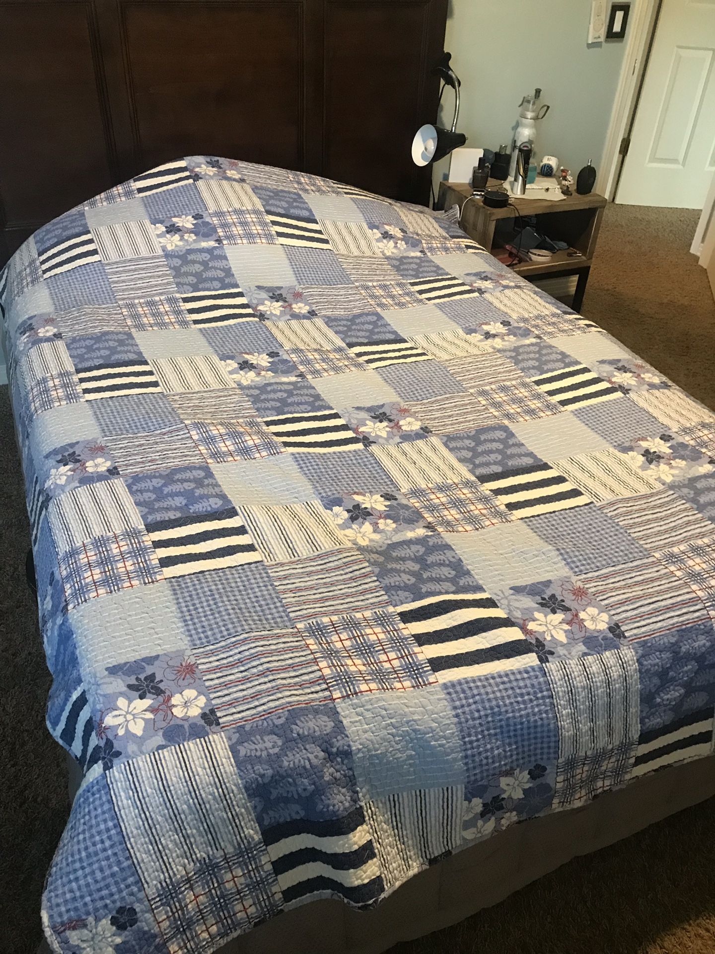 Two twin size reversible bedding quilts