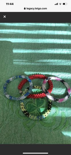 3 beaded roll on bracelets & 1 red beaded magnetic bracelet