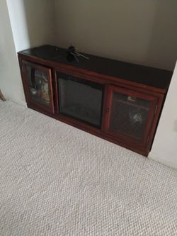 TV Stand With A Fireplace In It
