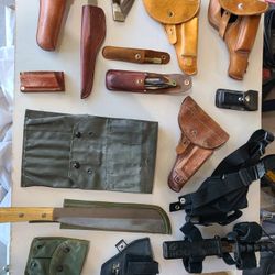 Assorted Knives And Holsters