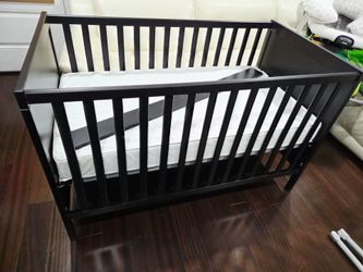 Black-Brown Crib With Toddler Bed Convertion Kit And Mattress Included.