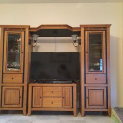 Solid tv wall unit with shelves