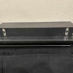 2 black floating shelves 