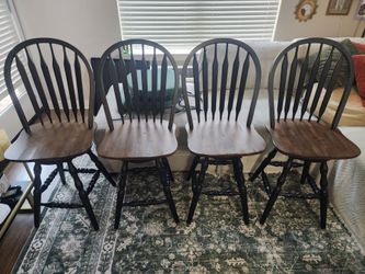 Windsor-style swivel dining chairs