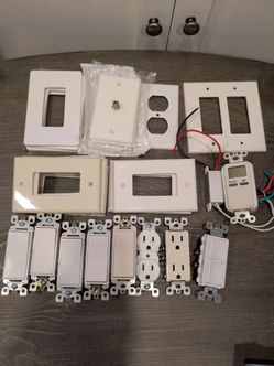 Mixed Lot of Electrical Switches, Outlets, and Wall Plates