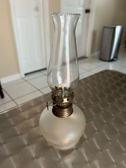 Very beautiful kerosene-style lamp with an adjustable wick; 8 inches tall.