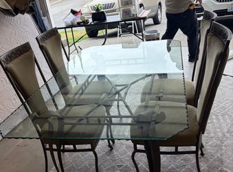 Glass top table and 4 chairs