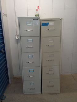 Metal file cabinet with key letter size $65 each