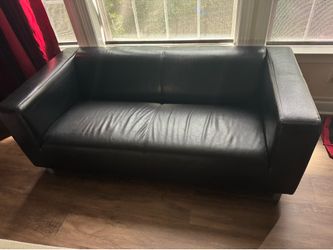 Ikea - Modern black leather sofa ( loveseat)