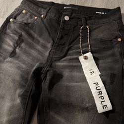 Size 31 Black Ripped Jeans With Back Tag