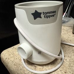 Bottle warmer tomme tipper 